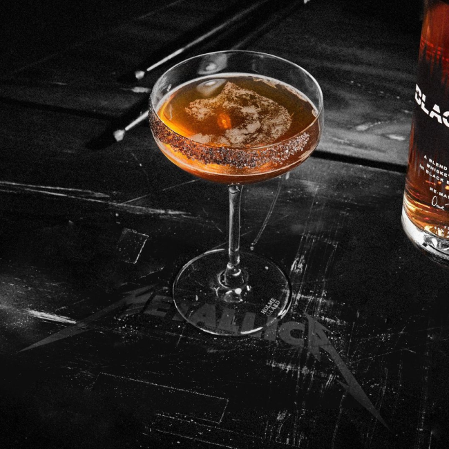 BLACKENED American Whiskey Forked Tongue Cocktail in a Coupe Glass