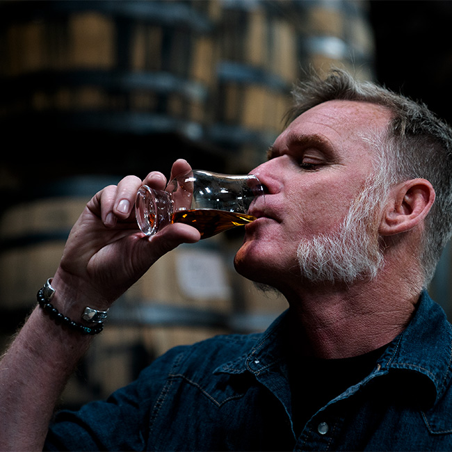 Master Distiller & Blender Rob Dietrich Sipping BLACKENED Whiskey from a Glencairn whiskey glass