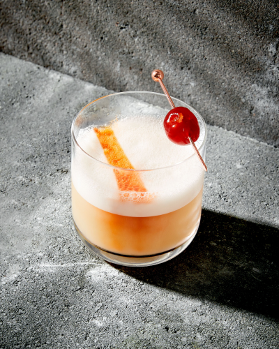 Whiskey sour cocktail in a whiskey glass